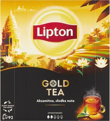 The image shows the packaging of Lipton Gold Tea, featuring a scenic landscape with a temple, tropical plants, and a cup of tea.