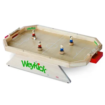 A wooden table football game with figures and a ball on a white background.