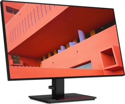 A computer monitor displaying a colorful architectural image.