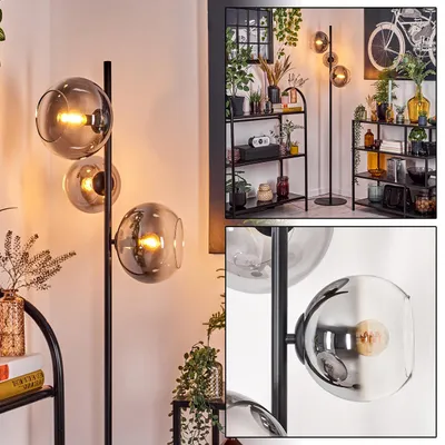 Produktbild von Carentino Stehlampe aus Metall/Glas in Schwarz/Rauchfarben/Klar mit Fußschalter