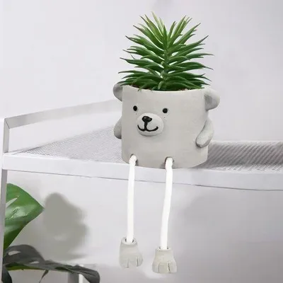 Image de Mini-succulentes artificielles rondes dans un pot en ciment artificiel
