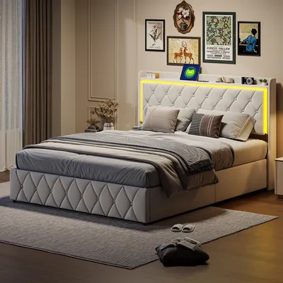 A bedroom scene featuring a bed with a tufted headboard and integrated lighting.