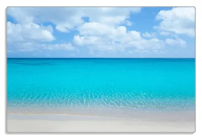Produktbild von Wallario Frühstücksbrettchen aus Glas 20 x 30 cm mit rutschfesten Füßen, Motiv Sandstrand und blaues Meer