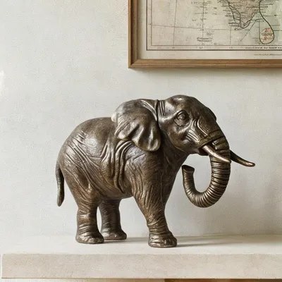 Produktbild von Elefantenfigur aus Gusseisen, patiniert in antiker Bronzeoptik, L.22 cm