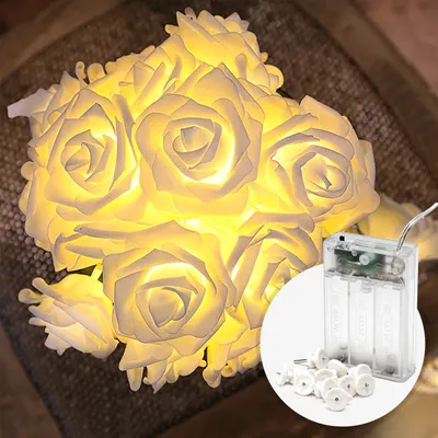 Produktbild von CozyHome Deko Rosen Lichterkette - 4 Meter & 20 Blumen LED Warmweiß I Mit Batterie Betrieb und Timer I Rosenkette Frühling Lichtergirlande Licht Tischdeko Lichter Ketten Innen inkl. Timerfunktion