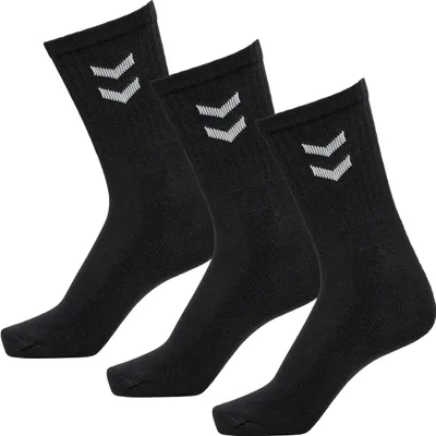 Three black socks with white logos are arranged diagonally on a white background.