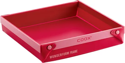 A red baking dish or frame.