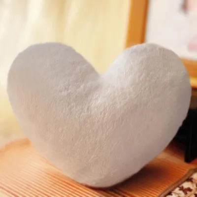 Immagine prodotto di Cuscino di peluche a forma di cuore, decorativo e soffice