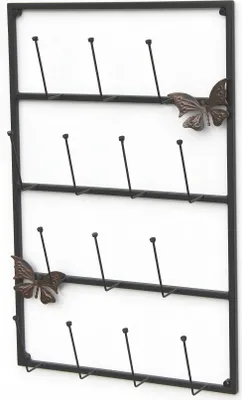 A black metal wall-mounted mug rack with decorative butterflies.