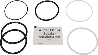 A collection of rubber O-rings and a small packet of lubricant, likely for plumbing fixtures.