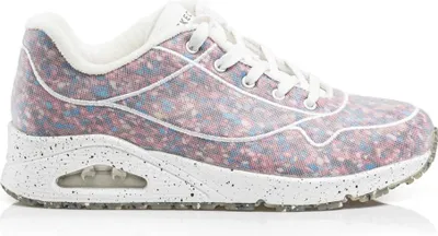 A side view of a single sneaker against a white background.