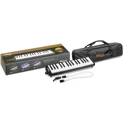 A Stagg Melodica with its accessories and packaging are displayed on a white background.