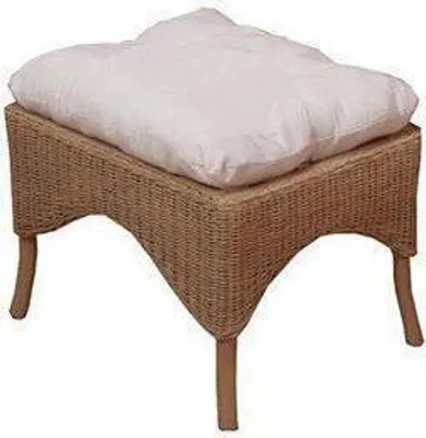 A wicker ottoman with a white cushion on a white background.