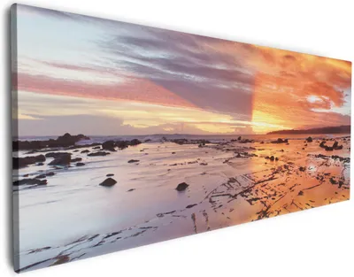 Produktbild von Wallario Premium Leinwandbild Wattwanderung am Meer bei Sonnenuntergang in Größe 60 x 150 cm