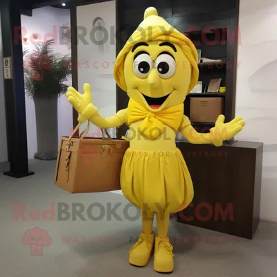 Immagine prodotto di Personaggio del costume della mascotte REDBROKOLY della paella gialla vestito con una camicetta e valigette
