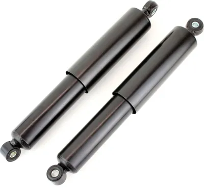 Two black shock absorbers are shown against a white background.