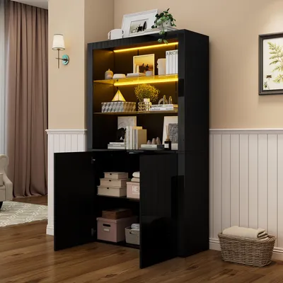 A black high-gloss display cabinet with LED lighting, showcasing various decorative items and storage boxes.
