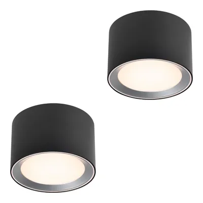 Two black cylindrical ceiling lights with silver trim are shown against a white background.