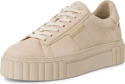 A close-up, studio shot of a single beige sneaker with a platform sole.