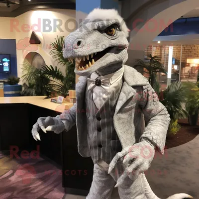 Image de Personnage de costume de mascotte REDBROKOLY d'Utahraptor argenté habillé d'un cardigan et d'épinglettes
