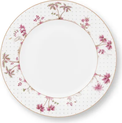 A single plate with a floral and dot pattern.