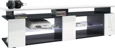 Produktbild von Vladon TV Board Movie V2 Game On Lowboard 138,5 x 39 x 39 cm inkl. LED-Beleuchtung Weiß, Korpus in Schwarz matt, Fronten in Weiß Hochglanz