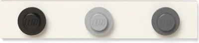 Three LEGO knobs on a white background.