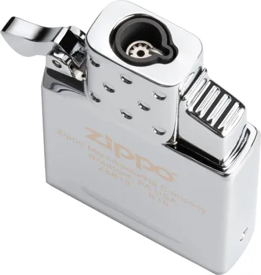 A close-up, high-angle shot of a Zippo lighter insert.