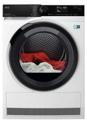A front view of a white AEG washing machine with a black control panel and door rim. Red and white laundry is visible inside the drum.
