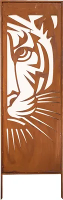 A metal garden screen with a tiger face design, made of weathered metal.