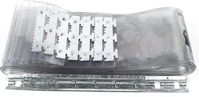 A roll of transparent PVC strips with metal attachments and a mounting rail.