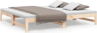 A wooden daybed with mattresses and pillows, set against a white background.