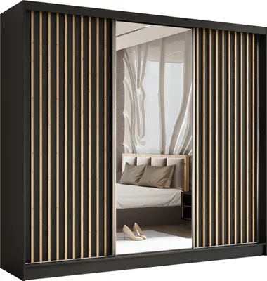 A bedroom scene with a wardrobe reflecting a bed and curtains.