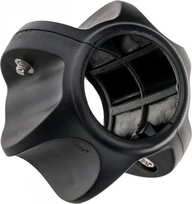 A black camera part, likely a mount or adapter, is shown against a white background.