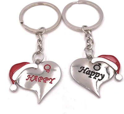 Produktbild von Onwomania Schlüsselanhänger Paaranhänger Liebe Herz Weihnachten Happy silber Anhänger Keychain