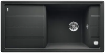 A top-down view of a black kitchen sink with a drain and a ribbed drying area.