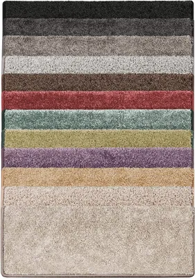 A collection of carpet samples in various colors.