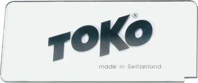 A white rectangular label with the brand name TOKO and 'made in Switzerland' printed on it.