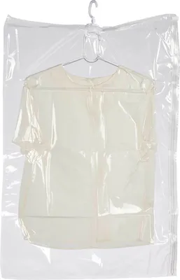 A transparent garment bag with a shirt on a hanger inside.