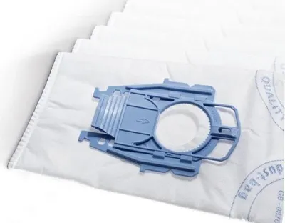 A stack of white vacuum cleaner bags with a blue plastic adapter attached to the top bag.
