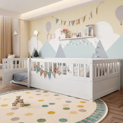 A child's bedroom with a white wooden bed and a colorful rug.