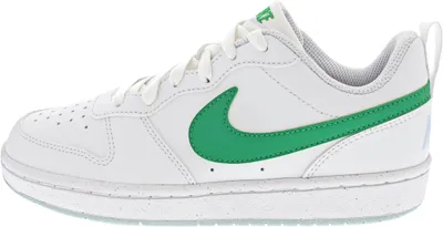A side view of a white Nike Court Borough Low Recraft sneaker with a green Nike swoosh.