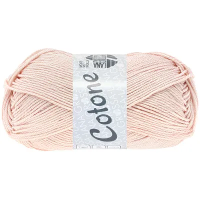 A ball of pink yarn with a label.