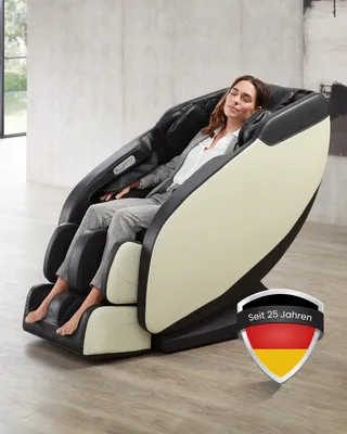 A woman is relaxing in a massage chair in a modern living room.
