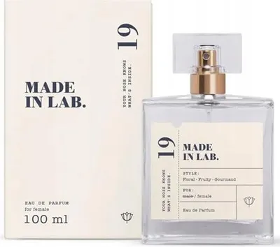 A bottle of perfume and its packaging are displayed against a white background.