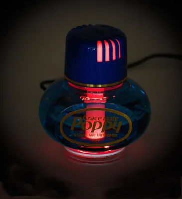 Produktbild von Original Poppy Lufterfrischer mit roter LED Beleuchtung 24 Volt, Duft Inhalt 150 ml, Duft Fresie