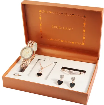 A jewelry set including a watch, necklace, earrings, and ring, presented in an open box.