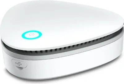 A white, oval-shaped electronic device with a glowing blue power button on top and a USB port on the side, set against a white background.