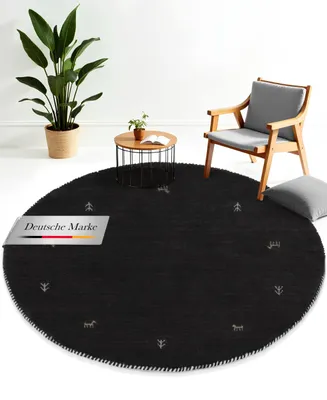 Produktbild von Wollteppich Gabbeh Uni Rund Schwarz Ø 250 | Moderner Teppich für Wohn- und Schlafzimmer