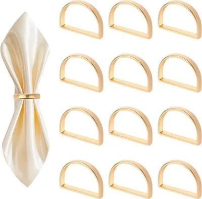 Produktbild von Sechs goldene Serviettenringe - halbkreisförmiges Metall - Tischdekoration für Hochzeit und Festlichkeiten.